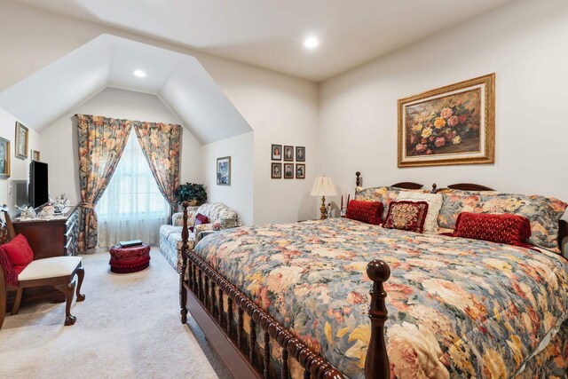 bedroom with recessed lighting, lofted ceiling, and carpet flooring