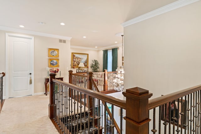 corridor featuring recessed lighting, carpet floors, visible vents, and an upstairs landing