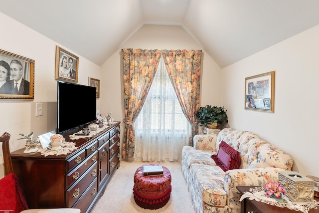 living room featuring vaulted ceiling and light carpet