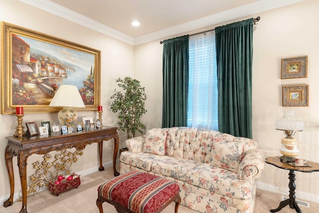 sitting room featuring recessed lighting, carpet floors, baseboards, and ornamental molding