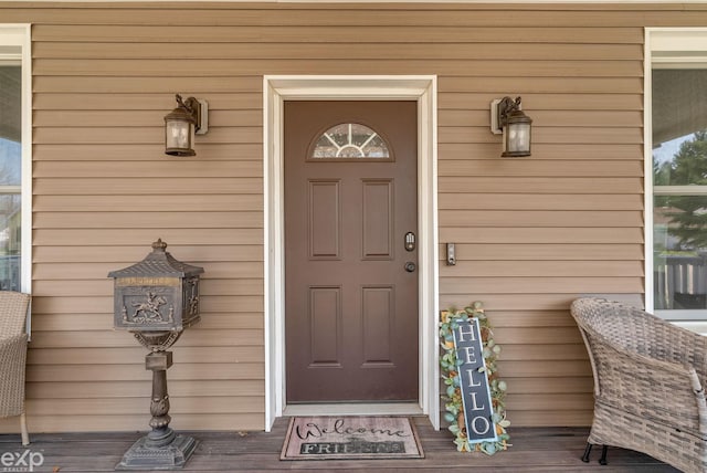 doorway to property featuring a porch