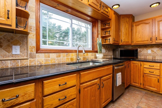 kitchen with open shelves, a healthy amount of sunlight, stainless steel appliances, and a sink