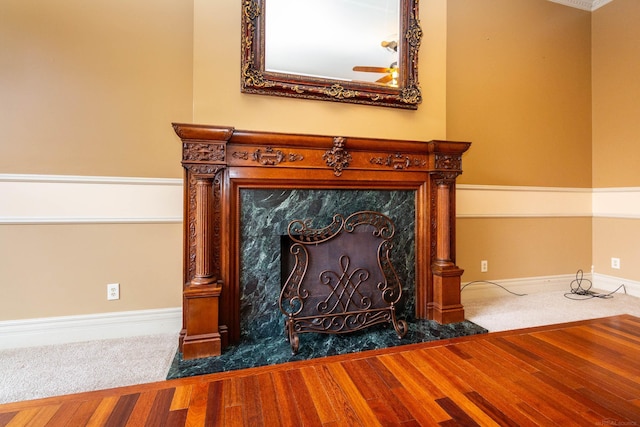 room details with baseboards and wood finished floors