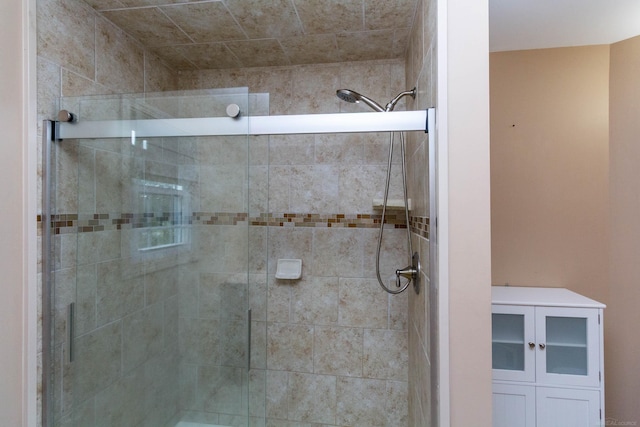 bathroom featuring a stall shower