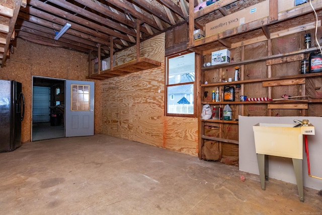 misc room with concrete floors