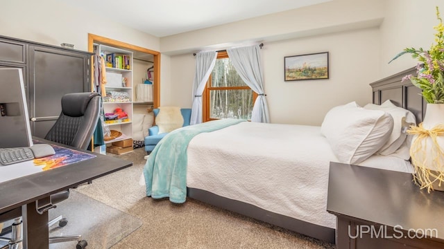 bedroom featuring carpet flooring
