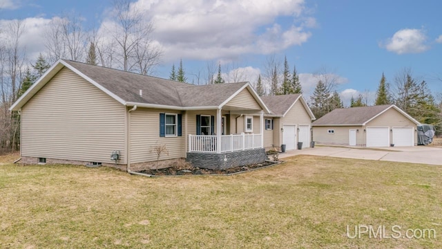 single story home featuring a front lawn, covered porch, and a detached garage