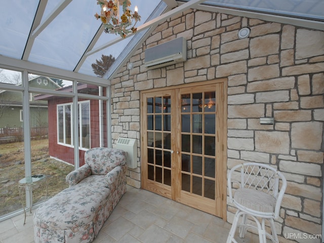 sunroom with a wall mounted air conditioner and an AC wall unit