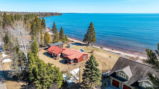 drone / aerial view with a view of the beach and a water view
