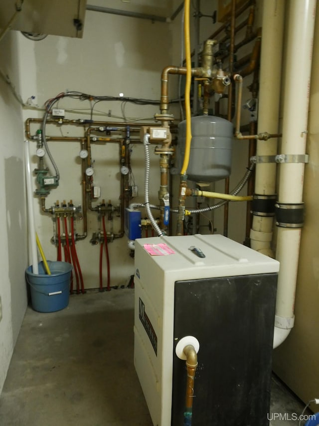 utility room featuring a heating unit