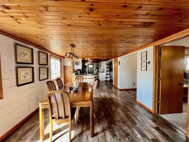 dining space with wooden ceiling, baseboards, an inviting chandelier, and dark wood finished floors
