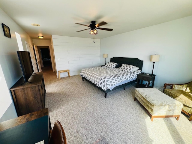 carpeted bedroom with a ceiling fan