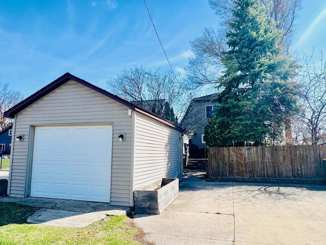 detached garage with fence