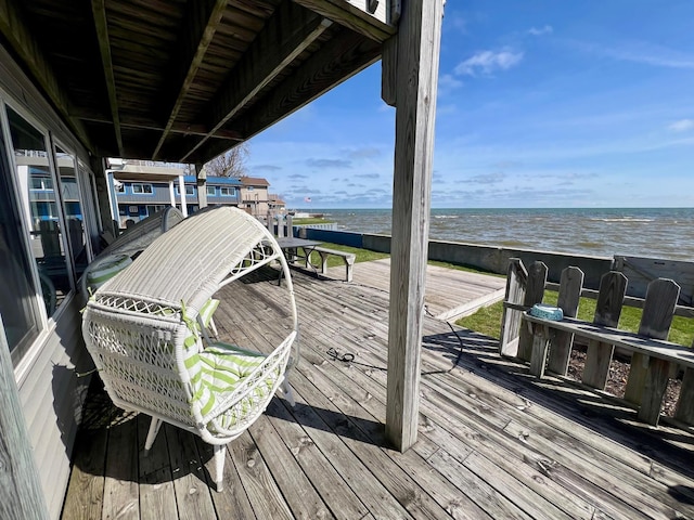 deck featuring a water view