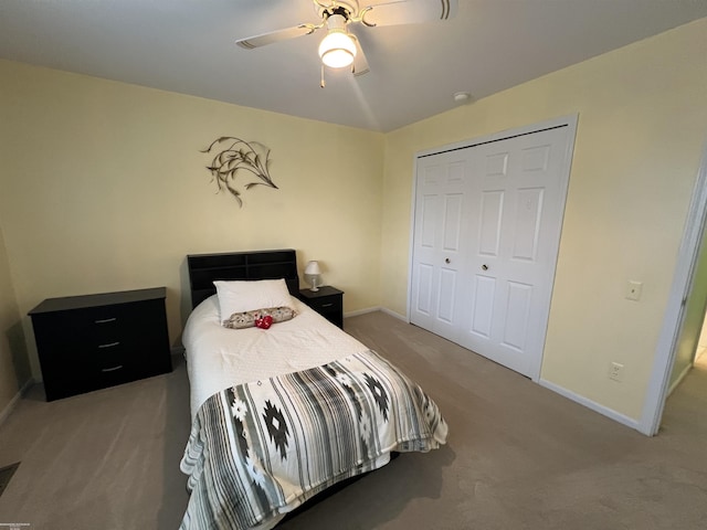 bedroom featuring baseboards, carpet, a closet, and ceiling fan