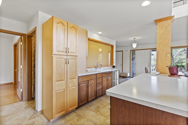 6728 Frith Rd, Smiths Creek, MI 48079 - kitchen featuring light countertops, baseboards, recessed lighting, and a sink