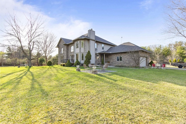 6728 Frith Rd, Smiths Creek, MI 48079 - back of house featuring a lawn, a garage, and a chimney