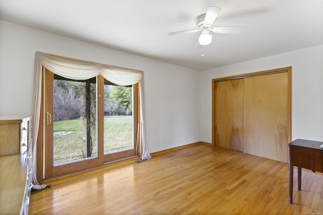 6728 Frith Rd, Smiths Creek, MI 48079 - unfurnished bedroom with a closet, ceiling fan, and light wood-style floors