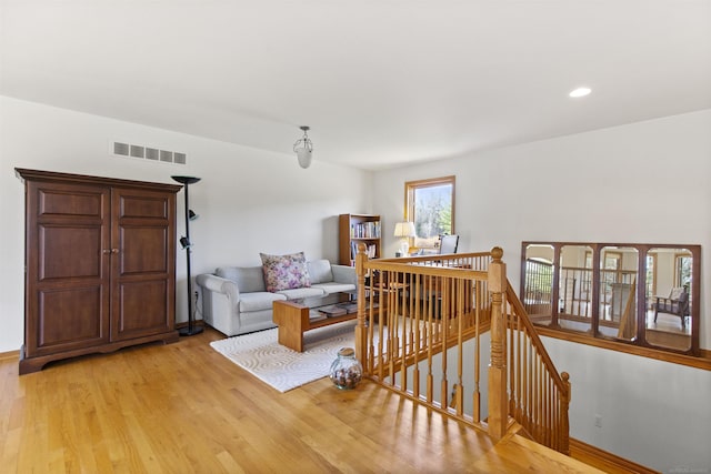 6728 Frith Rd, Smiths Creek, MI 48079 - living room with baseboards, visible vents, light wood finished floors, and recessed lighting