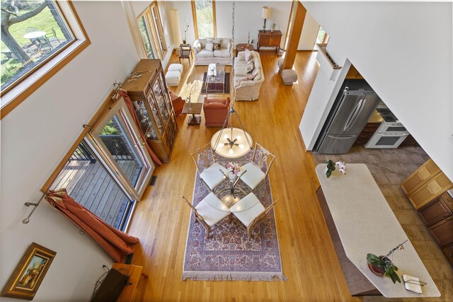 6728 Frith Rd, Smiths Creek, MI 48079 - living room with a high ceiling and wood finished floors