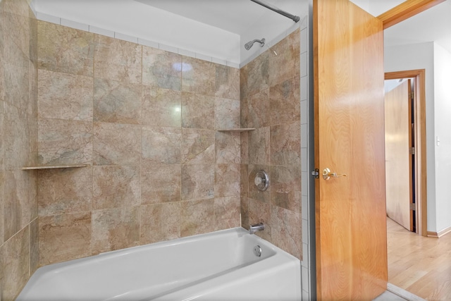 6728 Frith Rd, Smiths Creek, MI 48079 - bathroom featuring tub / shower combination and wood finished floors