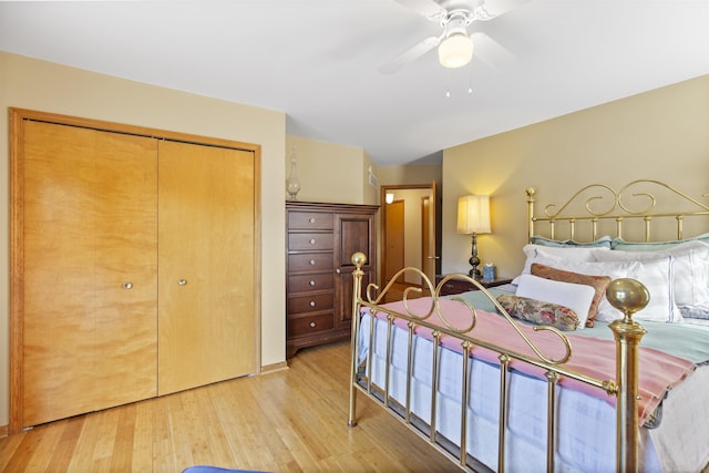 6728 Frith Rd, Smiths Creek, MI 48079 - bedroom with a closet, ceiling fan, and light wood-style flooring