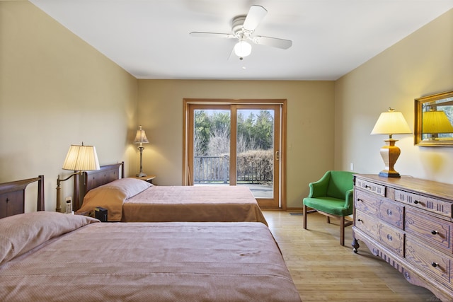 6728 Frith Rd, Smiths Creek, MI 48079 - bedroom with ceiling fan, access to outside, and light wood-style floors