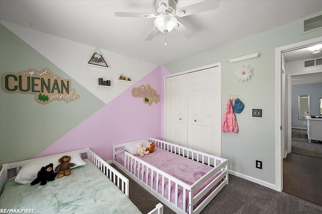 bedroom featuring a closet, carpet, visible vents, and baseboards