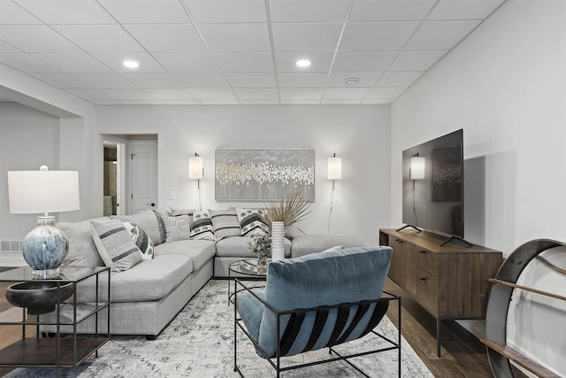 3897 Chatham Pl Unit 103, Brighton, MI 48114 - living room with wood finished floors, a drop ceiling, and recessed lighting
