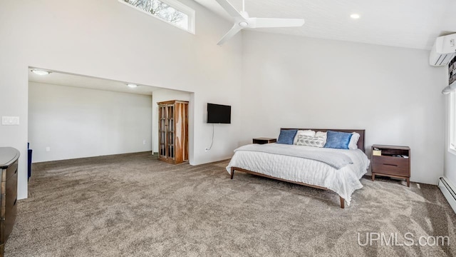 bedroom featuring a towering ceiling, carpet flooring, a wall mounted AC, and ceiling fan