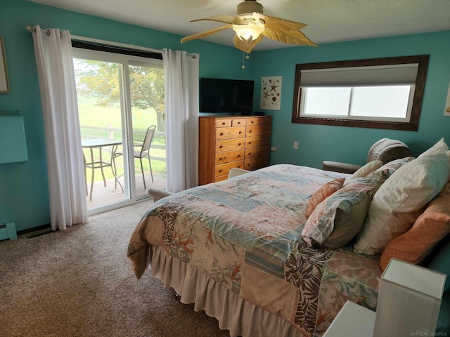 bedroom featuring ceiling fan, access to exterior, carpet flooring, and multiple windows