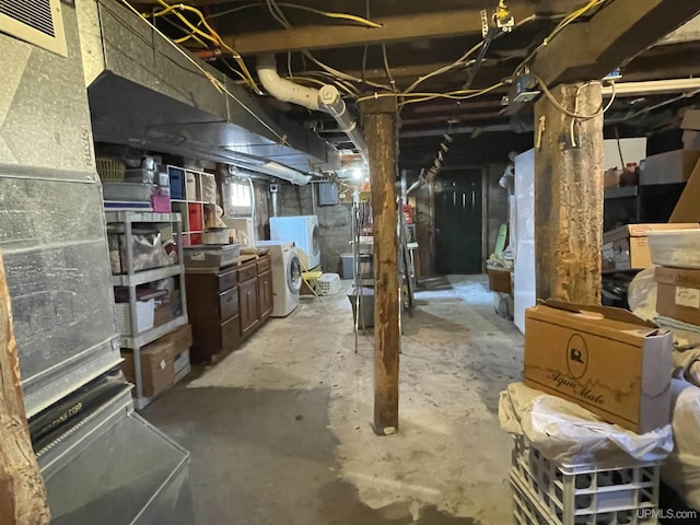 below grade area with visible vents and independent washer and dryer