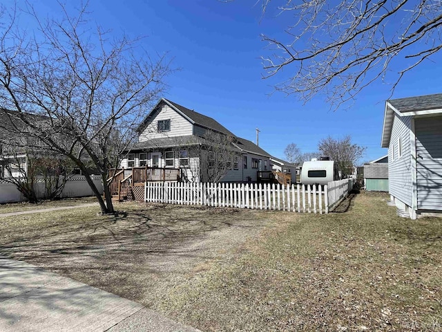 view of home's exterior featuring a fenced front yard