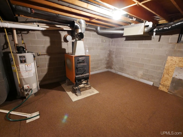 unfinished basement with water heater and concrete block wall