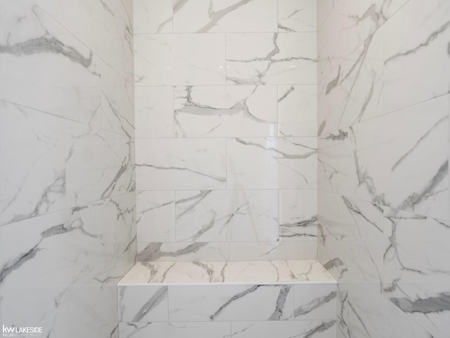 details featuring a tile shower