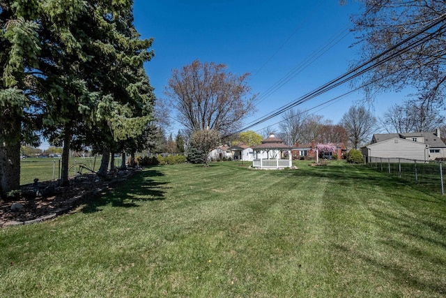 view of yard featuring fence