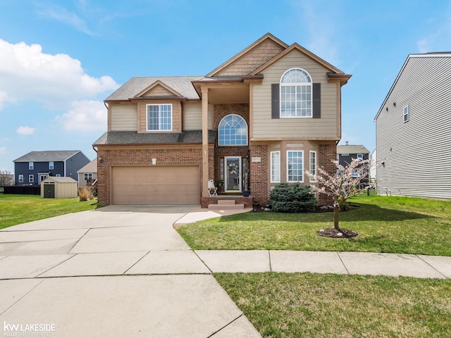 traditional home featuring an attached garage, brick siding, a front yard, and concrete driveway