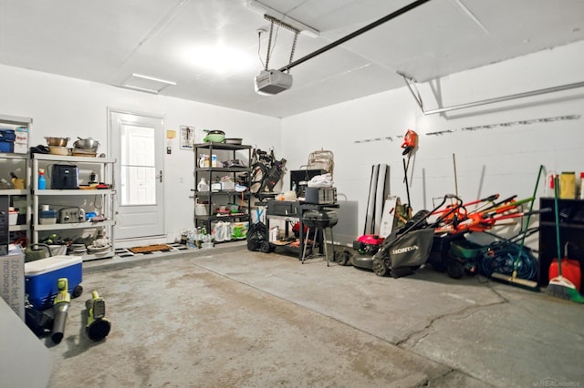garage featuring a garage door opener