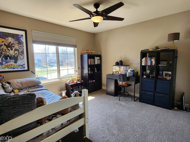 carpeted bedroom with ceiling fan