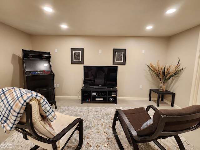 living room with baseboards and recessed lighting