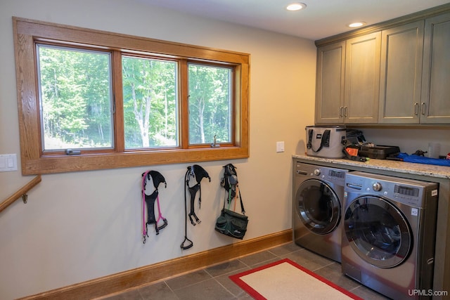 laundry area featuring tile patterned floors, washer and clothes dryer, baseboards, recessed lighting, and cabinet space