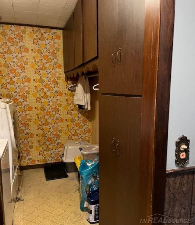 2255 E Sanilac Rd, Carsonville, MI 48419 - bathroom with wallpapered walls and tile patterned floors