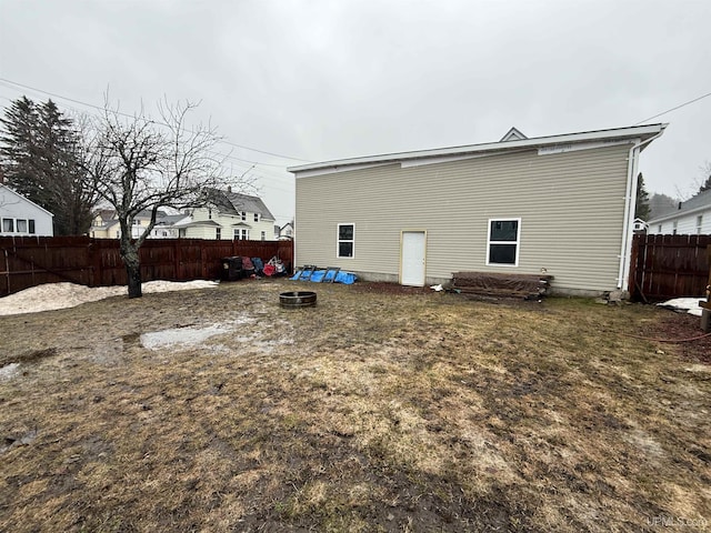 231 E Chocolay St, Munising, MI 49862 - back of property featuring a fenced backyard