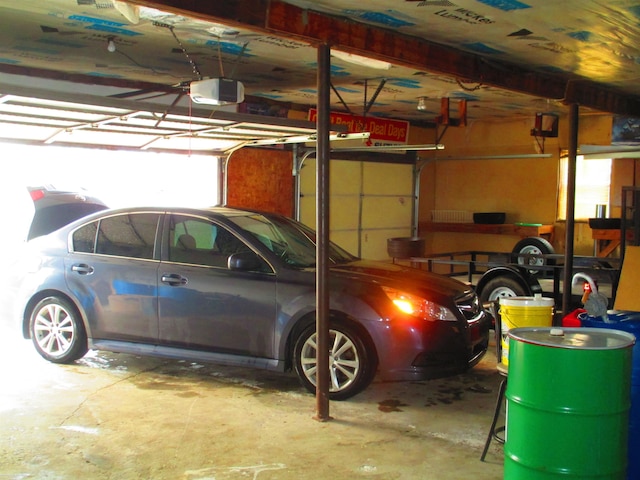garage featuring a garage door opener