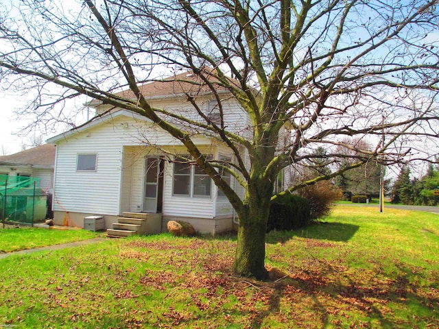 exterior space featuring a yard