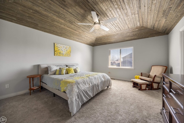 carpeted bedroom featuring vaulted ceiling, a ceiling fan, baseboards, and wooden ceiling