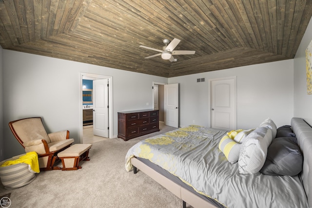 bedroom featuring wooden ceiling, vaulted ceiling, visible vents, and light colored carpet