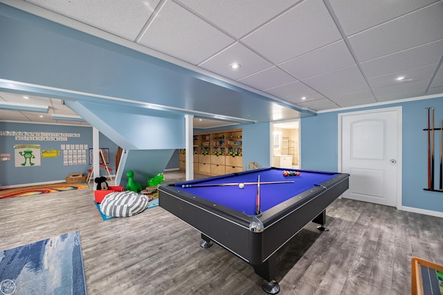rec room featuring recessed lighting, billiards, wood finished floors, baseboards, and a paneled ceiling