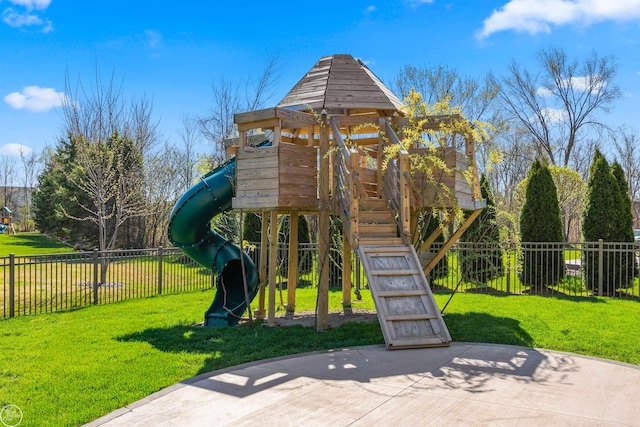 view of play area featuring a lawn and fence