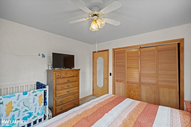 bedroom with a ceiling fan and a closet